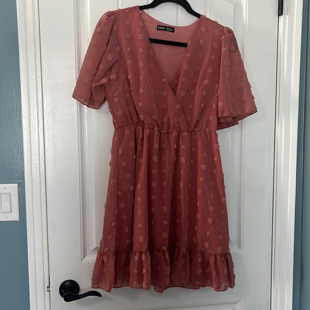 Light pink women’s dress.